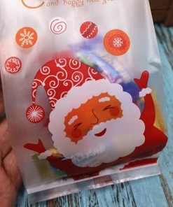 The American Store Christmas Gift Bag Collection 50 Pieces New Arrival Christmas Candy Bag Self Adhesive Gift Packing Bags For Party Home Decoration Bolsas Regalo Navidad