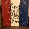 The American Store Patriotic Wood Sign, Land Of The Free Because Of The Brave Sign